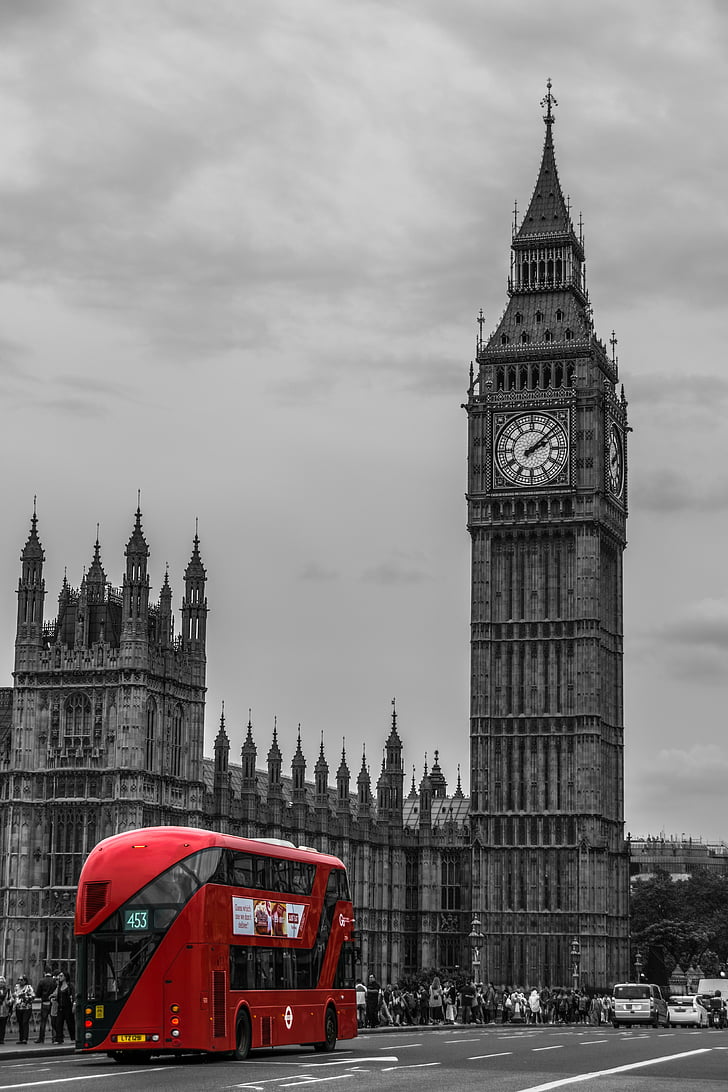 selective color photo of red bus