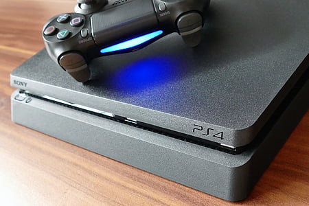 Sony PS4 slim console with controller