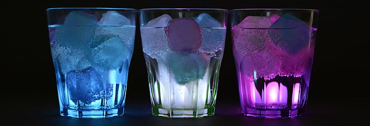 three blue, white, and purple rock glasses