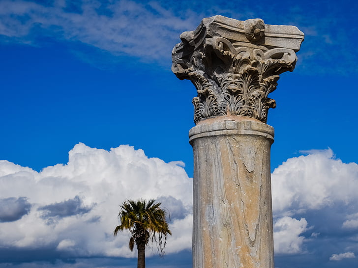 concrete pedestal column under blue sky