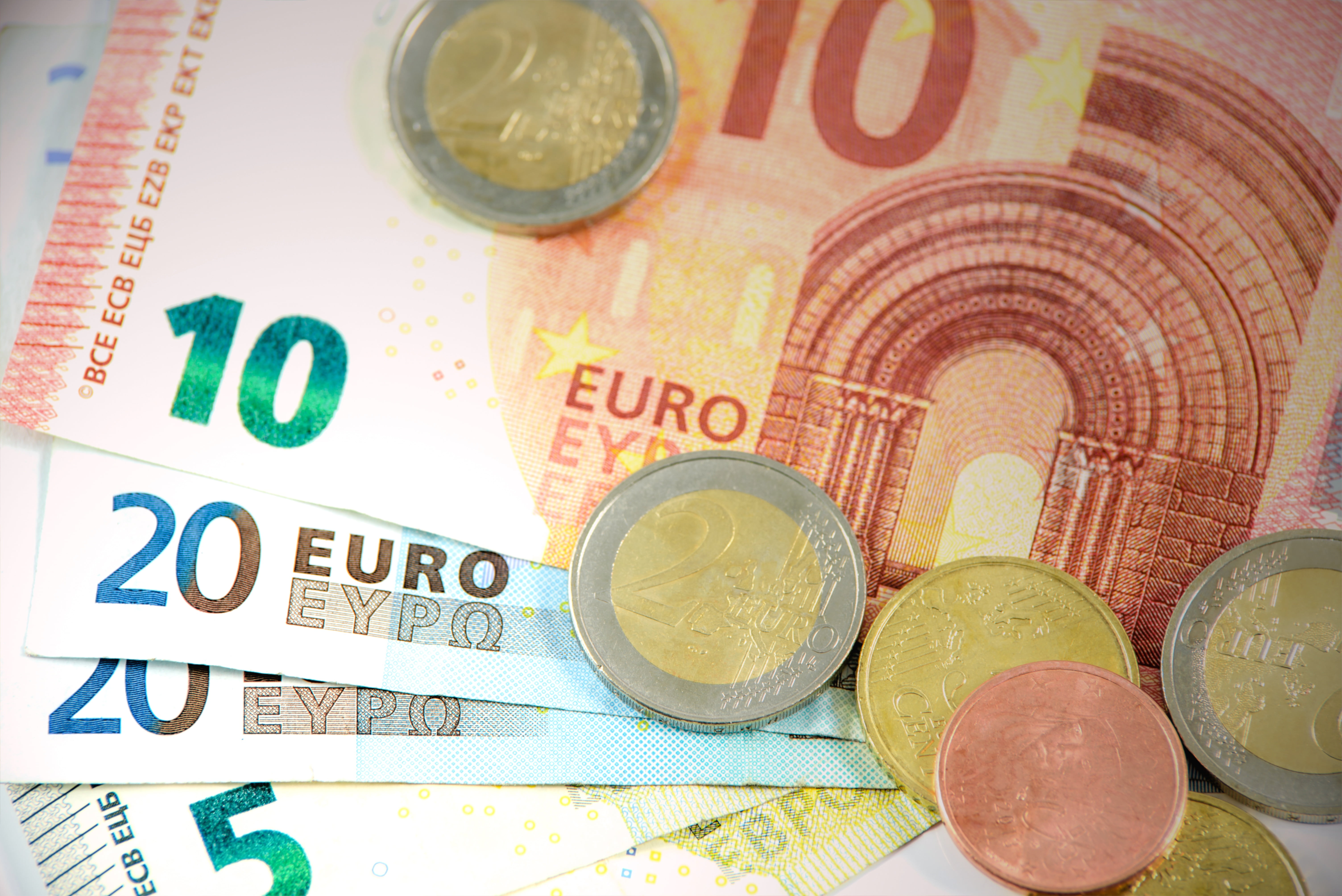 Royalty-Free photo: Stack of assorted Euro banknotes