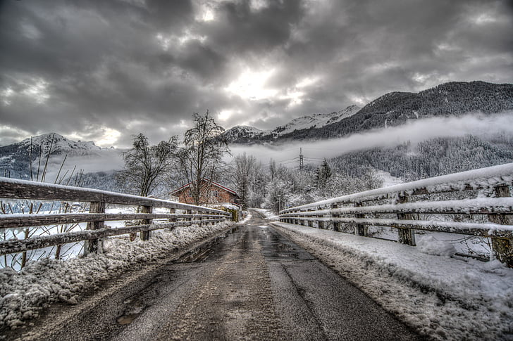 winding road with snow photo