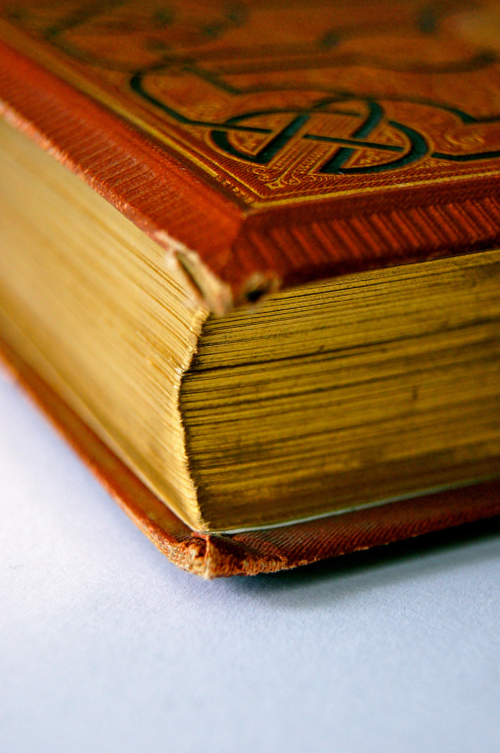 closeup photo of hard-bound book