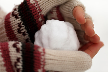 person holding snowball