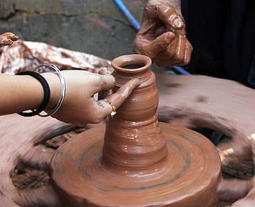 person pot making during daytime