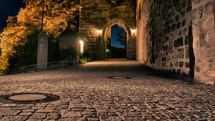 bricked road during nighttime