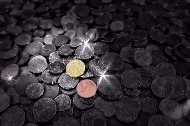 selective focus photography of assorted-denomination Indian coins