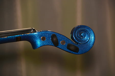 blue metal scrolled handheld tool