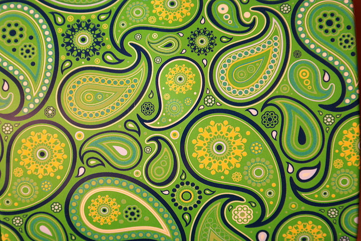 green paisley print textile