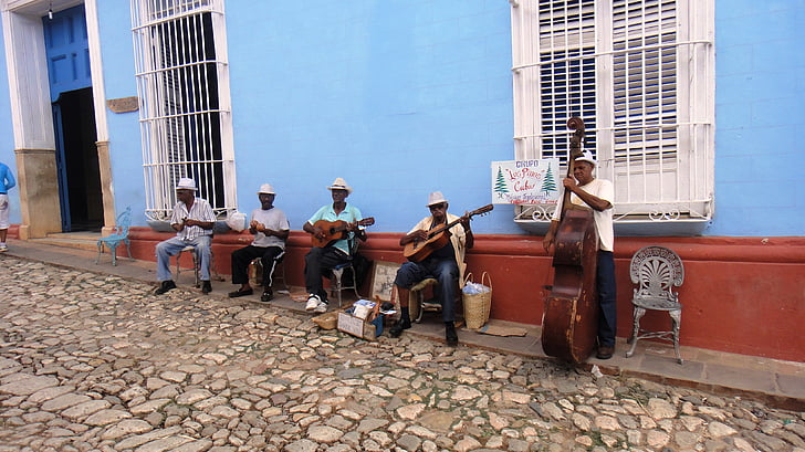 five men playing musical instrument