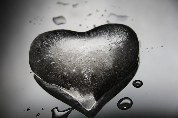 closeup photo of heart-shaped water droplet