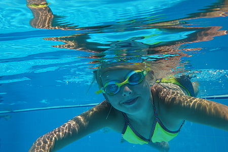 girl swimming in water