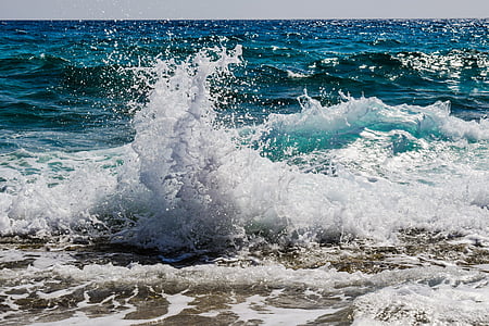 photo of blue sea waves