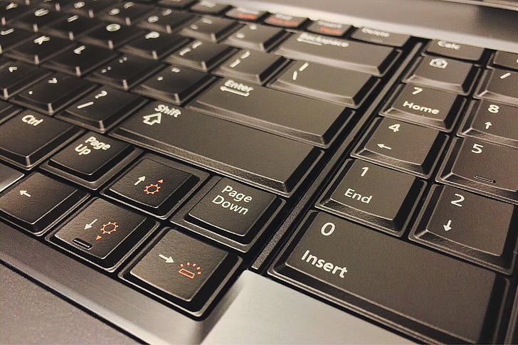 black and gray laptop computer keyboard