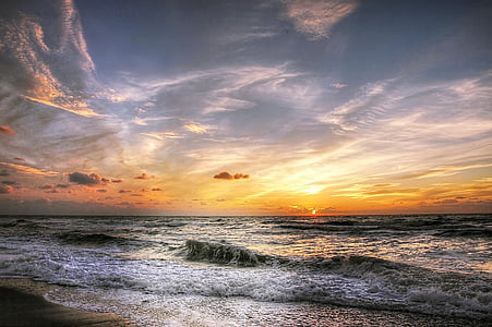 photo of seashore during golden hour