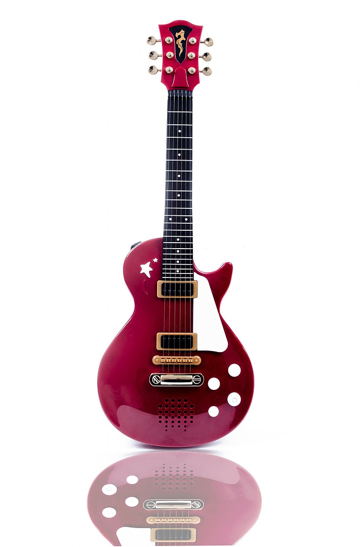red and pink Les Paul guitar
