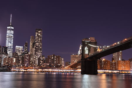 low angle photo of Brooklyn Bridge at nightime