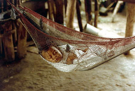 baby sleeping on hammock