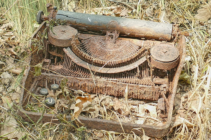 rusted vintage brown typewriter