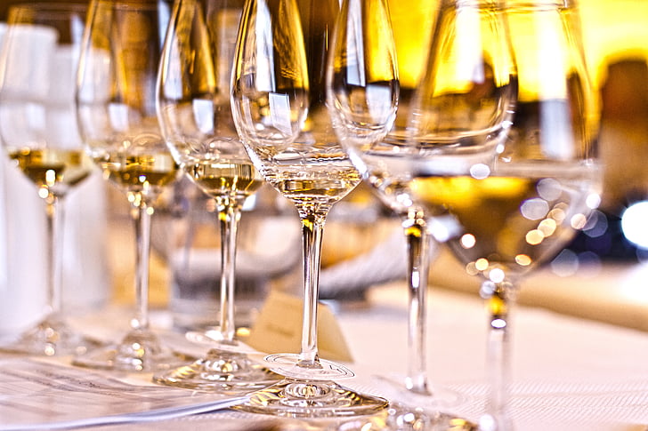 selective focus photography of wine glasses