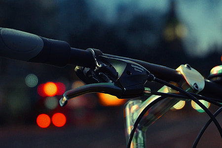 focused photo of a bicycle handle bar
