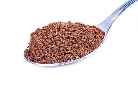 brown powder on spoon