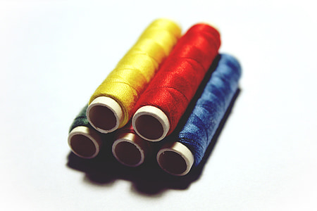 five assorted-color threads