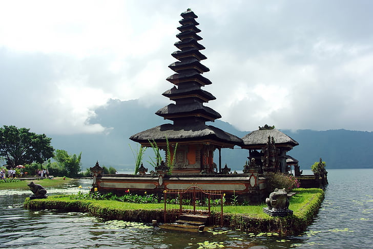 temple surrounded by body of water