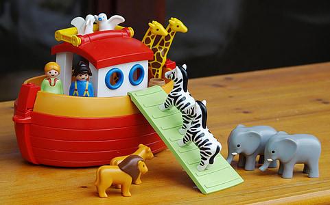 Noah's Ark toy set on top of brown surface