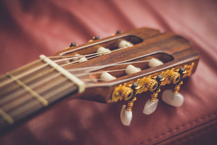 closeup photo of classical guitar headstock