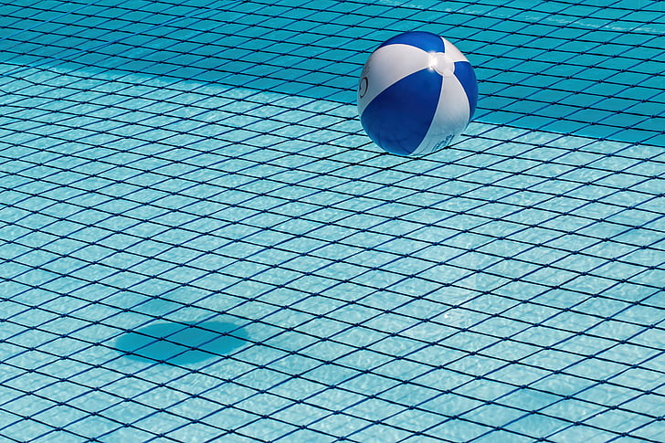 white and blue inflatable pool ball