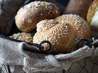 closeup photo of baked pastries with sesame seeds