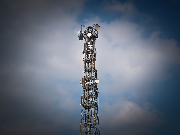 satellite tower with clouds background