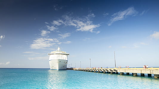 white cruise ship on seawater