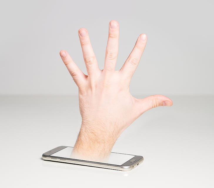 person showing hand on phone