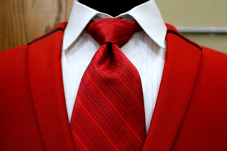 red and white collared suit with necktie