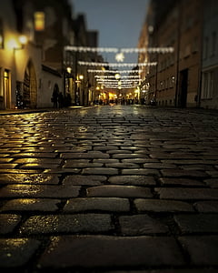 gray brick road during nighttime
