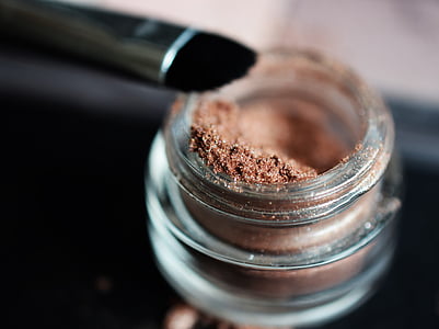 brown powder cosmetic jar