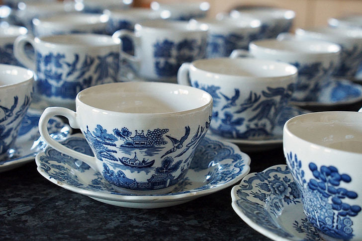 blue and white ceramic cup and saucers set