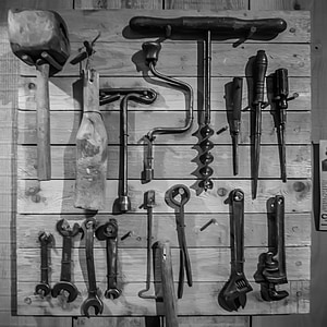 greyscale photography of carpentry tool