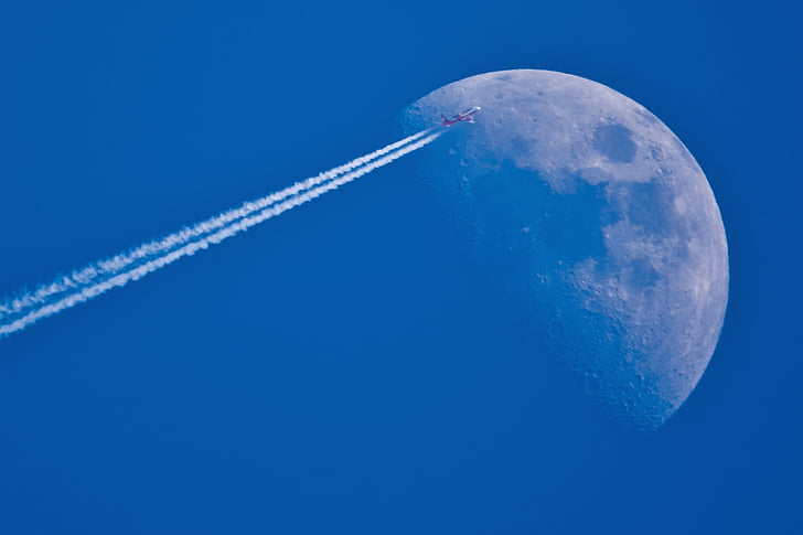 jet plane view with moon