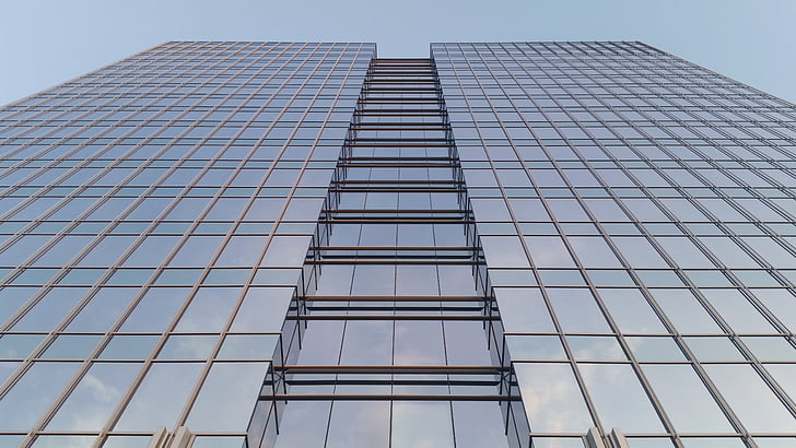 glass building under gray sky
