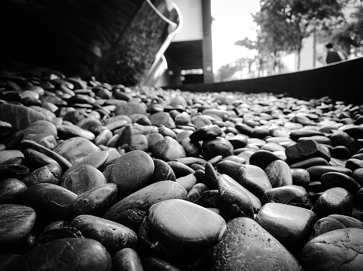 grayscale photo of stones
