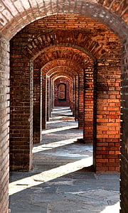 hallway with concrete archs