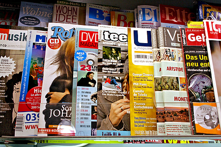 closeup photo of assorted-title magazines