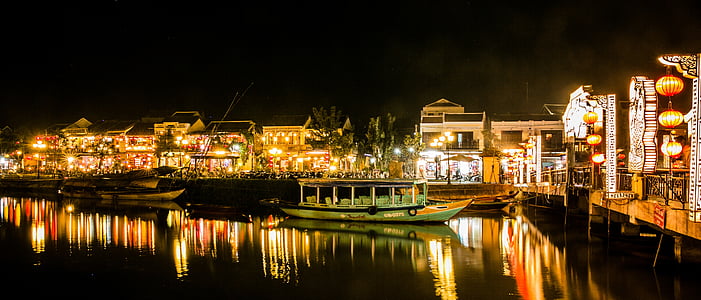 boats park on marina during nighttime