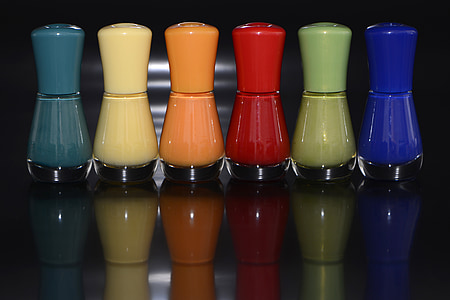 closeup photo of six assorted-color ceramic condiments shakers