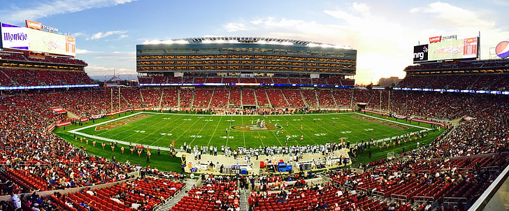 American football stadium field with spectator