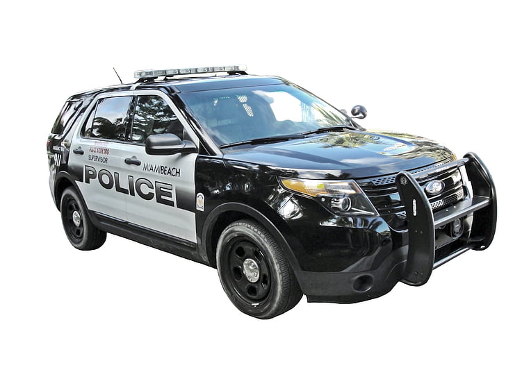 white and black Ford police car