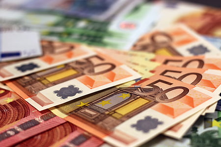 selective focus photography of 50 banknotes